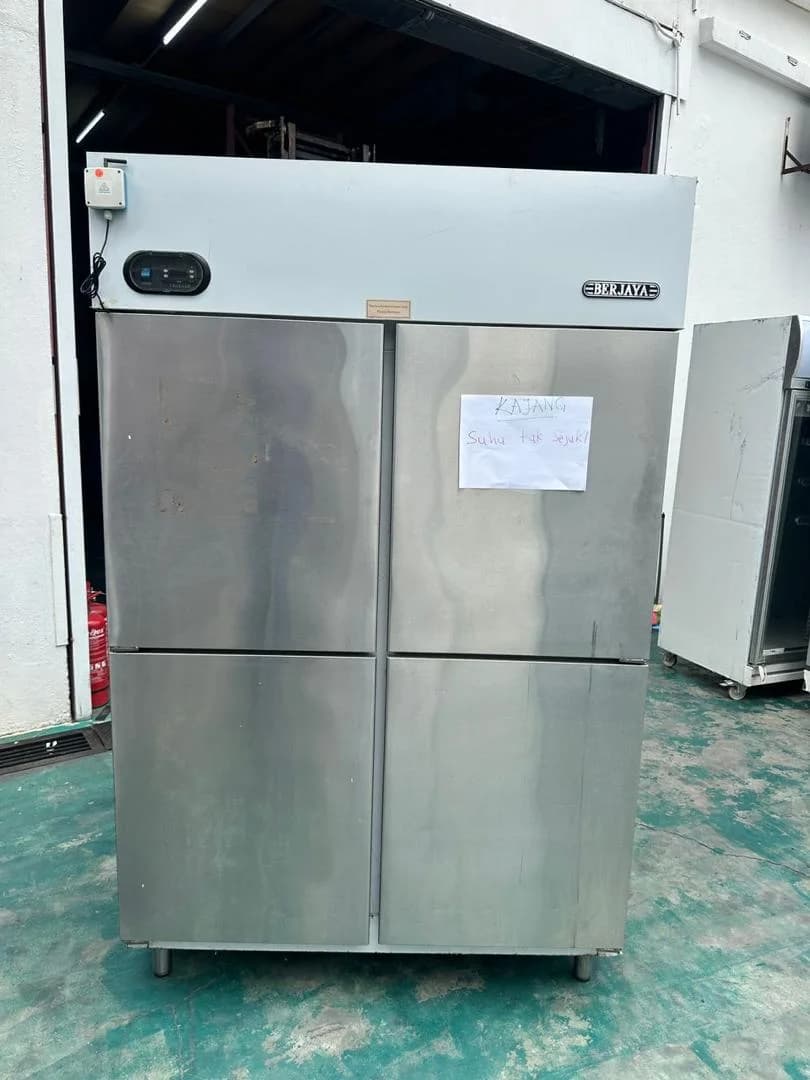 Stainless steel four-door commercial cooling cabinet at the workshop